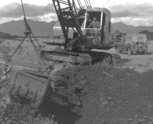 Primo in the dragline maintaining a drain